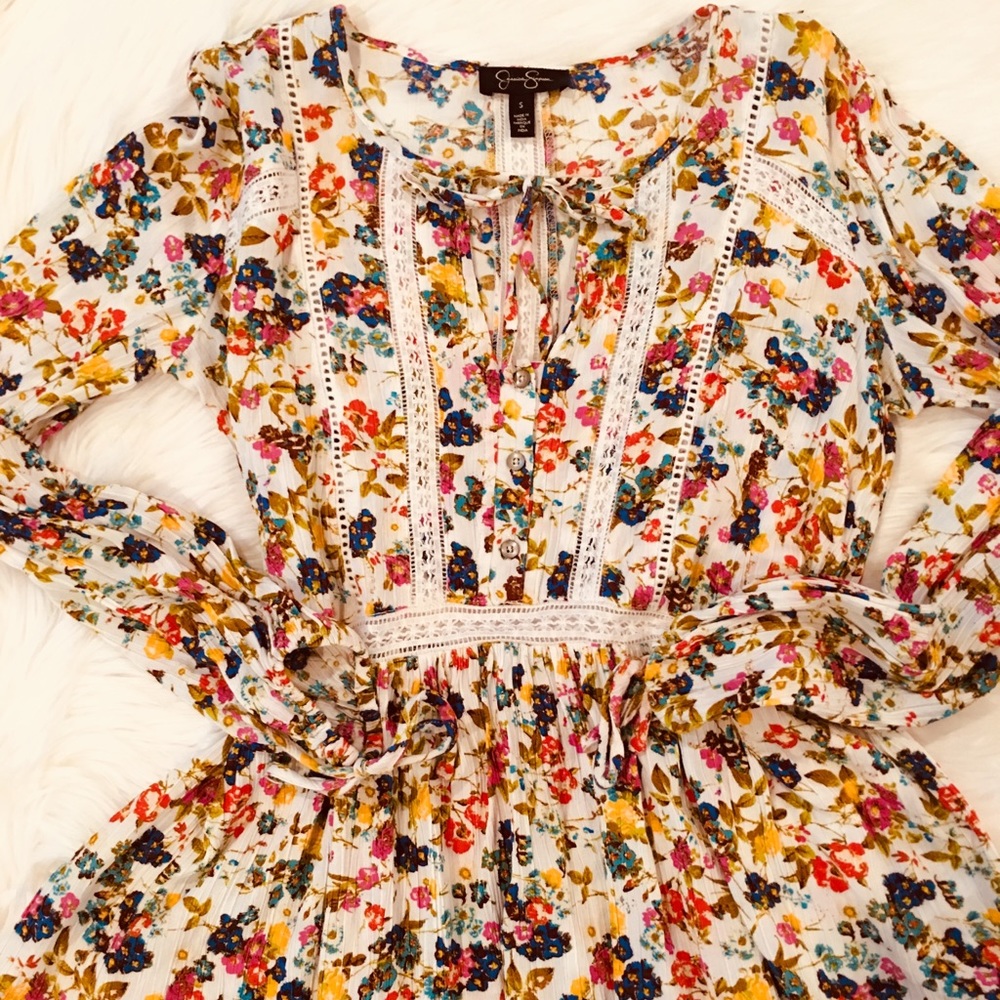 SoldJessica Simpson Peplum Flower Top